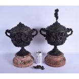 A LARGE PAIR OF 19TH CENTURY EUROPEAN TWIN HANDLED GRAND TOUR URNS After the Antique. 45 cm x 23 cm.