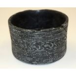 A CENTRAL ASIAN STONE BOWL. 6 cm wide.