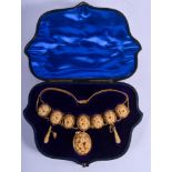 A FINE 19TH CENTURY CHINESE 22CT GOLD AND HORNBILL NECKLACE with matching earrings and pendant. Pend