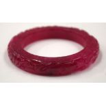 A CHINESE JADE BANGLE. 8 cm wide.