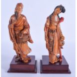 A PAIR OF EARLY 20TH CENTURY CHINESE BOXWOOD FIGURES OF IMMORTALS Qing, modelled upon wooden bases.