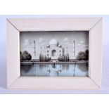 A LARGE 19TH CENTURY INDIAN PAINTED IVORY MINIATURE depicting the Taj Mahal. 20 cm x 16 cm.