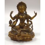 A CHINESE JEWELLED BRONZE BUDDHA. 21 cm high.