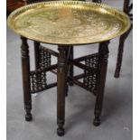 A SYRIAN MIDDLE EASTERN BRASS TOP TABLE decorated with foliage. 58 cm x 53 cm.