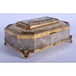 AN UNUSUAL 1930S CONTINENTAL SILVER GILT AND ENAMEL CASKET painted with buddhistic figures. 31.6 oz.