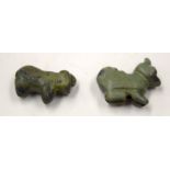 TWO CENTRAL ASIAN STONE AMULETS. (2)