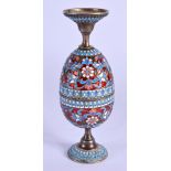 AN UNUSUAL ANTIQUE RUSSIAN DOUBLE COMBINATION SILVER ENAMEL EGG CUP decorated with foliage. 3.9 oz.