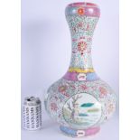 A FINE 19TH CENTURY CHINESE FAMILLE ROSE GARLIC NECK VASE Daoguang, Qing, bearing Qianlong marks to