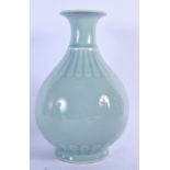 A 19TH CENTURY CHINESE CELADON MOULDED PORCELAIN VASE bearing Qianlong marks to base. 25.5 cm high.