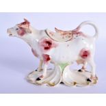 A VERY RARE 18TH CENTURY DERBY COW CREAMER AND COVER of naturalistic form. 15 cm wide.