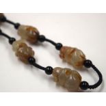 A CHINESE JADE NECKLACE. 48 cm long.