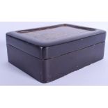 A 19TH CENTURY JAPANESE MEIJI PERIOD BLACK LACQUER BOX AND COVER opening to reveal several smaller b
