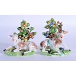 A PAIR OF 18TH CENTURY DERBY FIGURES of a stag and hind. 12 cm x 8 cm.