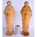 A LARGE PAIR OF 19TH CENTURY ITALIAN CARVED ALABASTER FIGURES OF FEMALE SAINTS modelled in the medie