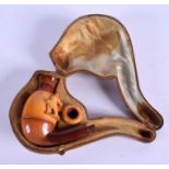 A VERY RARE 19TH CENTURY CARVED MEERSCHAUM EROTIC MEERSCHAUM PIPE formed with a very rare outer slee