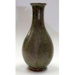 A CHINESE POTTERY VASE. 29 cm high.