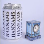 A FINE EARLY 20TH CENTURY SWISS SILVER AND ENAMEL MINIATURE CLOCK enamelled with blue motifs and sup