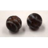 TWO TIBETAN AGATE BEADS. (2)