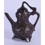 A VERY RARE 17TH CENTURY CHINESE BRONZE SCHOLARS WATER DROPPER Ming, decorated with swirling motifs.