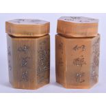 A PAIR OF 19TH CENTURY CHINESE SILVER INLAID RHINOCEROS HORN COSMETIC BOXES AND COVERS decorated wit