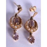 A PAIR OF EDWARDIAN GOLD PEARL AND AMETHYST EARRINGS. 3.7 grams.