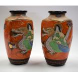 A PAIR OF JAPANESE SATSUMA STYLE VASES. 25 cm high.