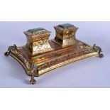 A MID 19TH CENTURY FRENCH BRONZE AND MALACHITE INKWELL decorated with scrolling motifs and vines. 21
