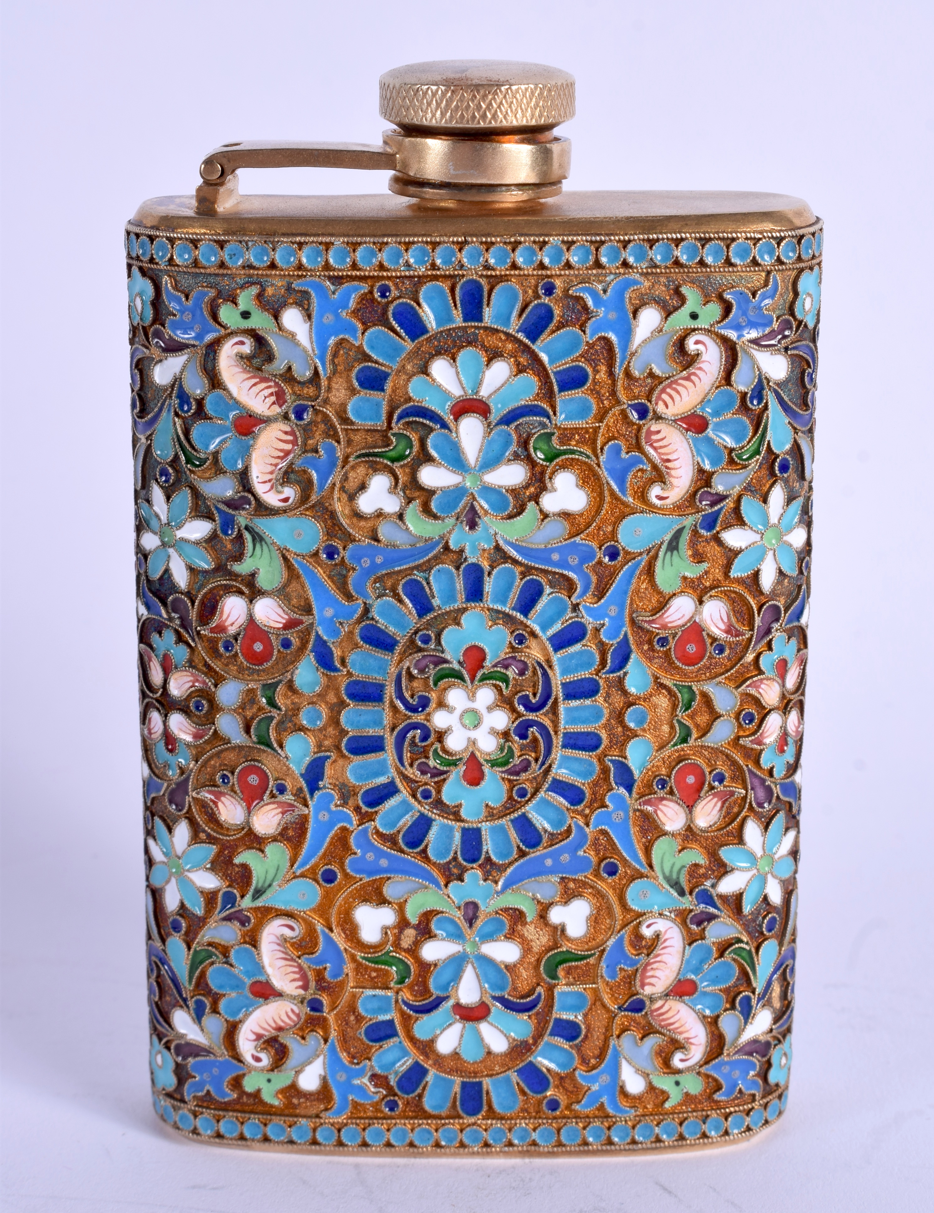 AN UNUSUAL CONTINENTAL SILVER AND ENAMEL HIP FLASK decorated with foliage. 8 oz. 11.5 cm x 7.5 cm.