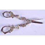 A PAIR OF 1950S SILVER GRAPE SCISSORS. Birmingham 1976. 4.1 oz. 15 cm long.