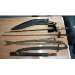 A GOOD COLLECTION OF ANTIQUE SWORDS AND BLADES in various forms and sizes. (qty)