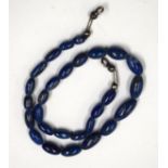 A CHINESE LAPIS NECKLACE.