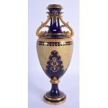 A 19TH CENTURY COALPORT TWIN HANDLED PORCELAIN VASE jewelled with turquoise sprays. 24 cm x 7 cm.