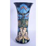 A MOORCROFT COLLECTORS CLUB SYMPHONY VASE. 26 cm high.