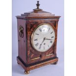 A GOOD REGENCY FLAME MAHOGANY BRACKET CLOCK with bold circular dial and black numerals. 34 cm x 20 c