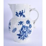 AN 18TH CENTURY WORCESTER MASK JUG decorated with flowers. 20 cm x 12 cm.