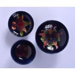 THREE MOORCROFT BOWLS. Largest 13 cm wide. (3)