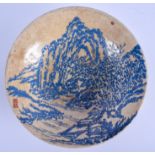 A 1950S CHINESE POTTERY BLUE ENAMELLED CIRCULAR BOWL painted with extensive landscapes. 30 cm diamet