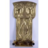 AN ARTS AND CRAFTS BRASS TWIN CANDLE HOLDER WALL PLAQUE decorated with foliage. 51 cm x 21 cm.