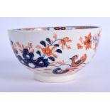 AN 18TH CENTURY LOWESTOFT SMALL SLOPS BOWL painted with the two birds pattern. 10 cm wide.