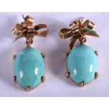 A PAIR OF VINTAGE 9CT GOLD AND TURQUOISE EARRINGS. 7 grams.