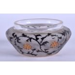 AN ART NOUVEAU FRENCH GLASS BOWL by Daum Nancy, enamelled with black and gold foliage. 8.5 cm wide.