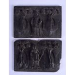 A PAIR OF EARLY 18TH CENTURY CONTINENTAL CARVED WOOD TREEN PANEL depicting figures within landscapes
