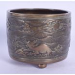 A 19TH CENTURY CHINESE CYLINDRICAL BRONZE CENSER Qing, decorated in relief with beasts within landsc