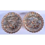 A PAIR OF 19TH CENTURY JAPANESE MEIJI PERIOD SATSUMA DISHES painted with samurai within landscapes.