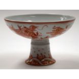 A CHINESE STEM FOOT DRAGON BOWL. 11 cm x 14 cm.