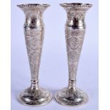A PAIR OF ANTIQUE PERSIAN SILVER VASES. 5.2 oz. 15.5 cm high.