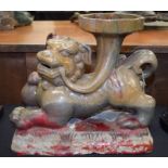 A LARGE CHINESE FLAMBE STONEWARE LION TILE. 26 cm x 24 cm.