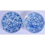 A PAIR OF 17TH CENTURY CHINESE BLUE AND WHITE SCALLOPED DISHES Kangxi, painted with floral sprays. 2