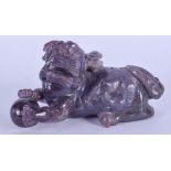 A LATE 19TH CENTURY CHINESE CARVED AMETHYST BUDDHISTIC BEAST modelled recumbent 9 cm x 4 cm.