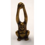 A TIBETAN BRONZE MONKEY. 5.5 cm high.